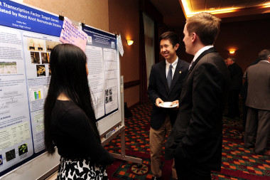 Jonathan Kuo explains research at the SMT Celebration