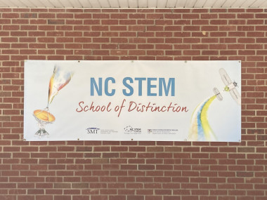 Oakboro STEM Choice School proudly displays its banner.